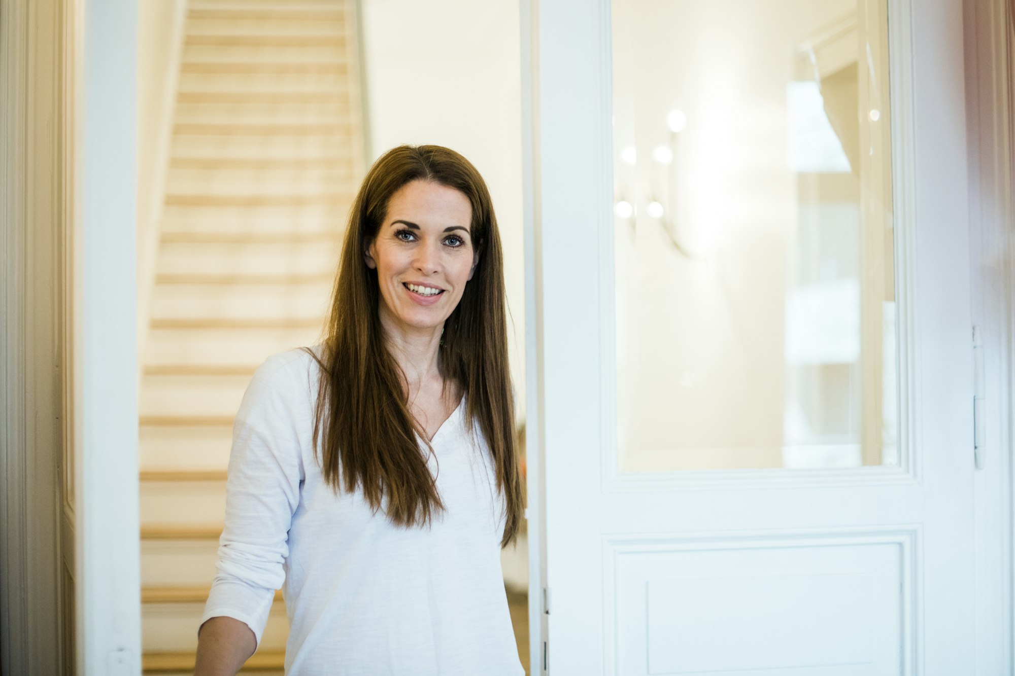 Portrait of smiling woman at home